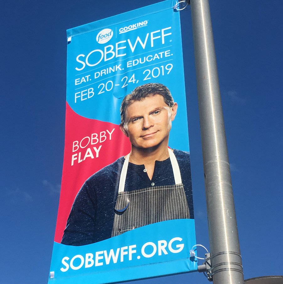 Custom street pole banner printed by Pro-Care Sign