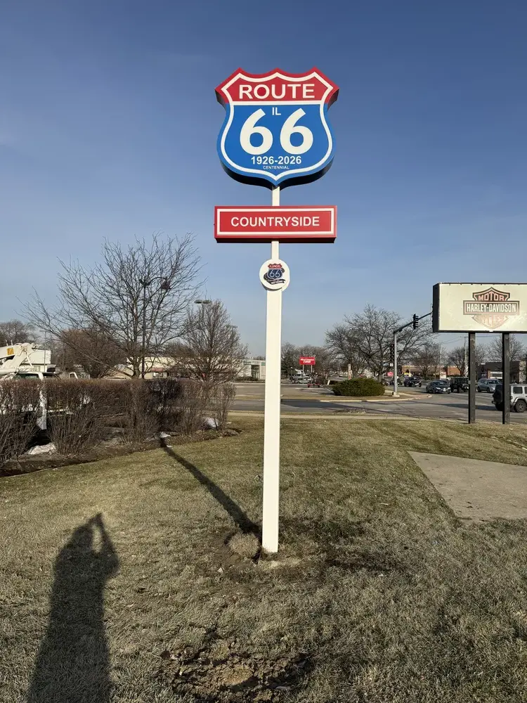Illuminated pylon sign on a single pole in Chicagoland
