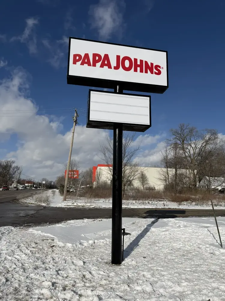 Papa Johns pylon sign installed by Pro-Care Sign