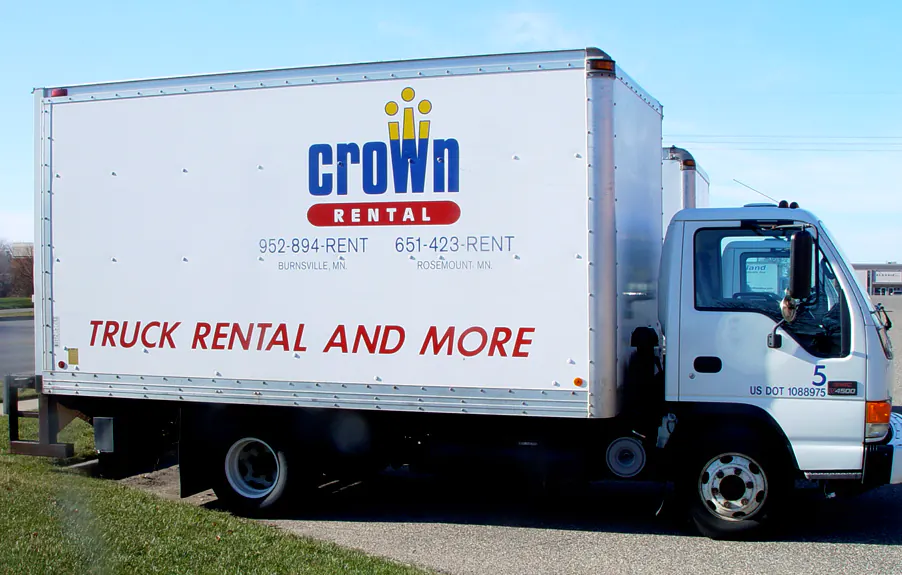 Printed logo and truck rental lettering on a white box truck